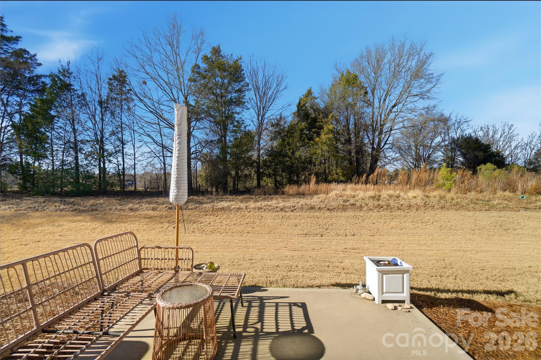 3627 Secrest Landing Monroe, NC 28110 - Photo 28 of 32 a view of a terrace with a bench