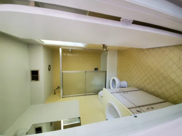 a bathroom with a sink and a toilet