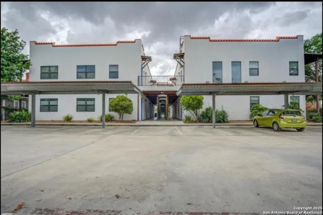 front view of a house with a garden