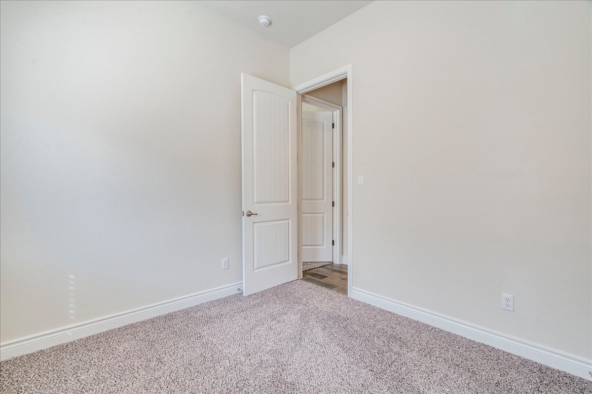 124 Compass Lane Kyle, TX 78640 - Photo 21 of 38 a view of an empty room