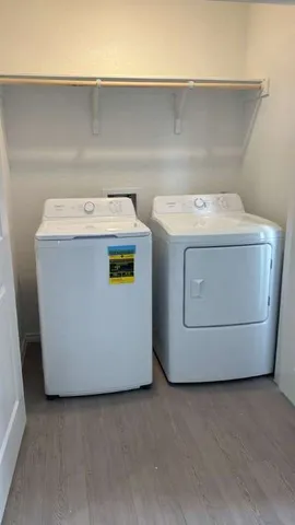 a utility room with dryer and washer