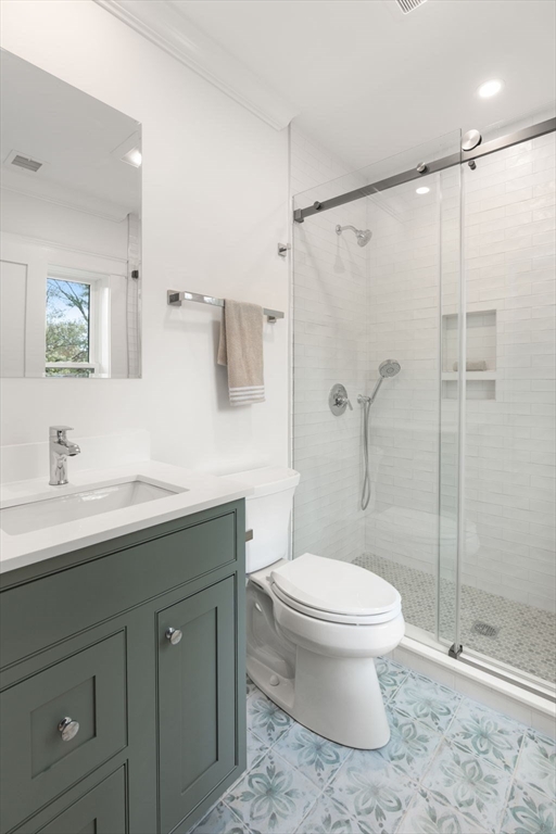 82 Deer Path Lane Weston, MA 02493 - Photo 33 of 42 a bathroom with a sink toilet and shower
