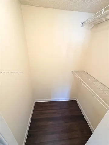 a view of small space with racks on the wall