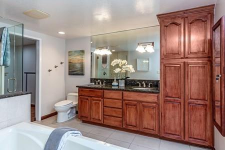 10120 United Place Cupertino, CA 95014 - Photo 11 of 30 a bathroom with a sink a toilet and shower