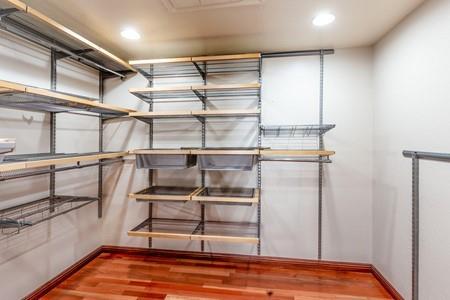 10120 United Place Cupertino, CA 95014 - Photo 13 of 30 a view of a room with racks on the wall