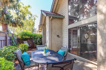 10120 United Place Cupertino, CA 95014 - Photo 18 of 30 a view of balcony with a table and chairs
