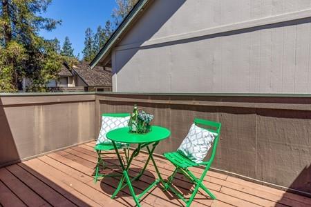 10120 United Place Cupertino, CA 95014 - Photo 19 of 30 a balcony with table and chairs