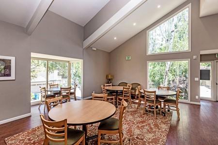 10120 United Place Cupertino, CA 95014 - Photo 26 of 30 a living room with furniture and a large window
