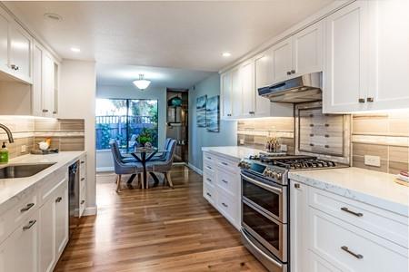 10120 United Place Cupertino, CA 95014 - Photo 3 of 30 a kitchen with a stove and a sink