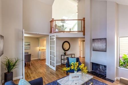 10120 United Place Cupertino, CA 95014 - Photo 5 of 30 a living room with furniture and a fireplace
