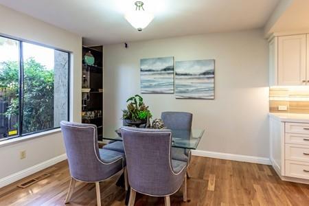 10120 United Place Cupertino, CA 95014 - Photo 6 of 30 a view of a dining room with furniture window and wooden floor