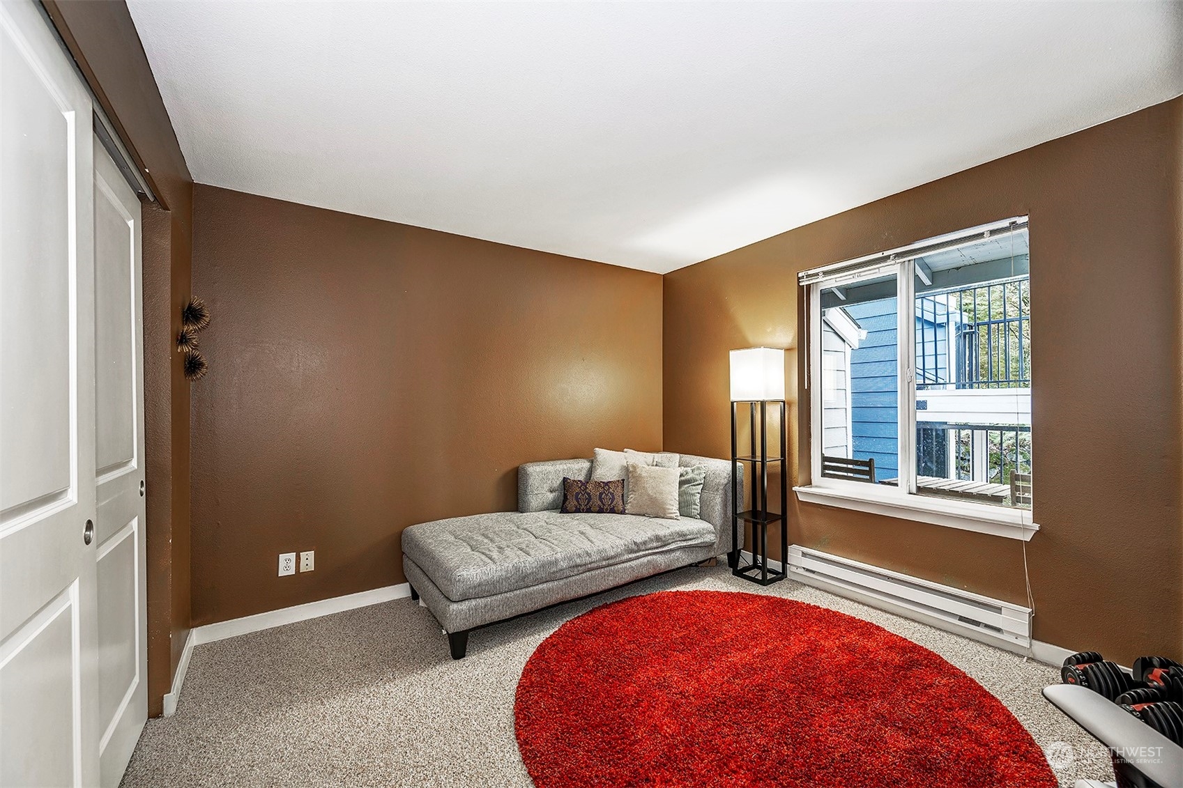 3918 243rd Place Southeast, Unit F303 Bothell, WA 98021 - Photo 11 of 23 a bedroom with a bed and a window