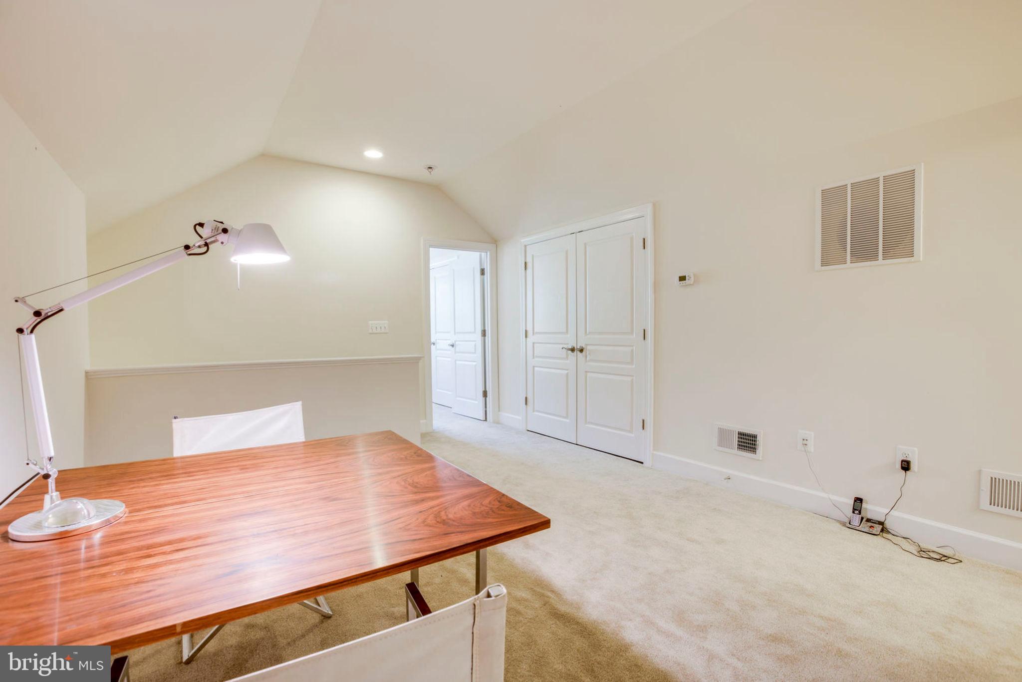 1299 Scotts Run Road McLean, VA 22102 - Photo 17 of 22 a view of a room with a table and chair