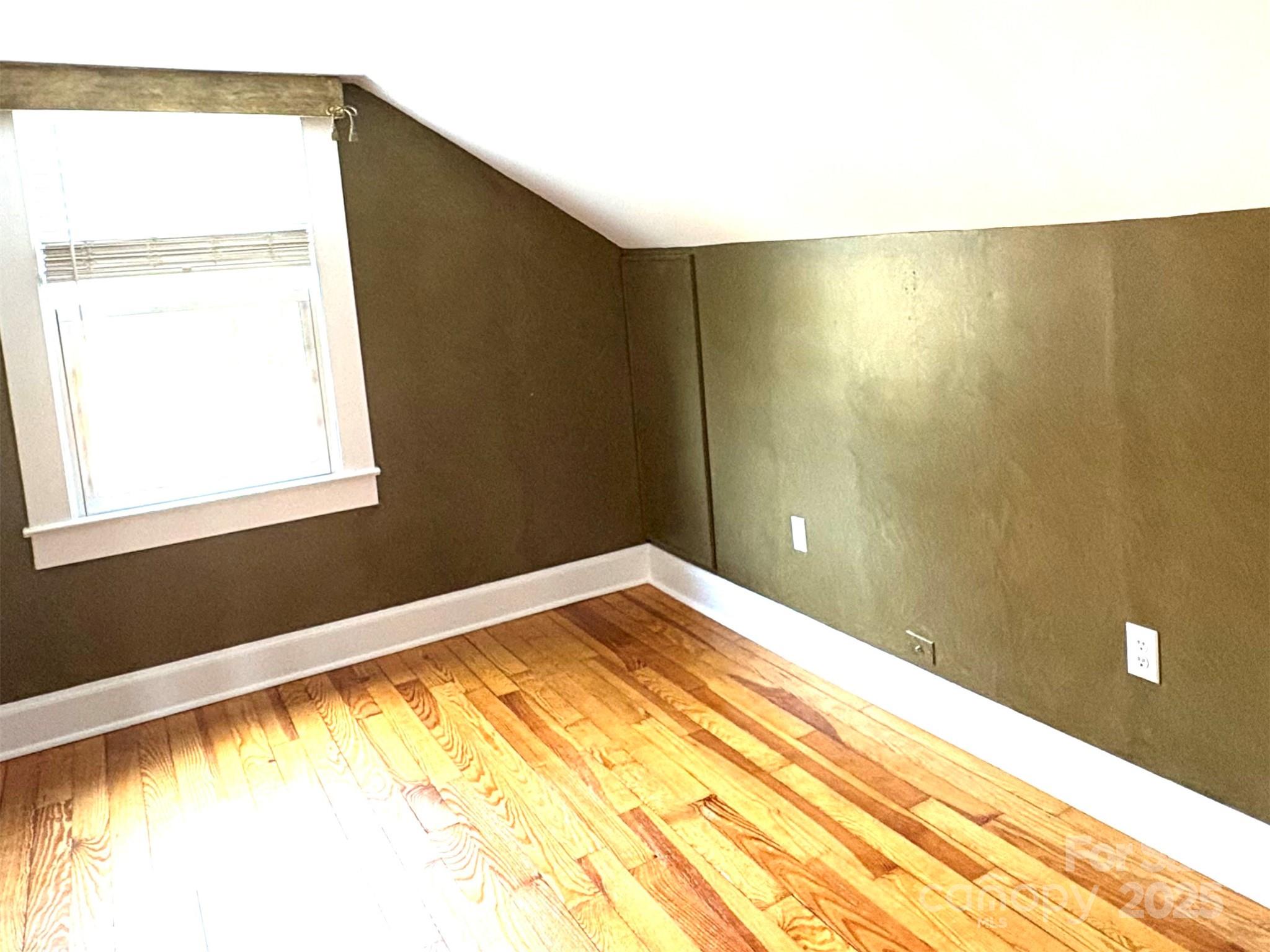 114 Broadway Tryon, NC 28782 - Photo 22 of 41 a view of an empty room and window