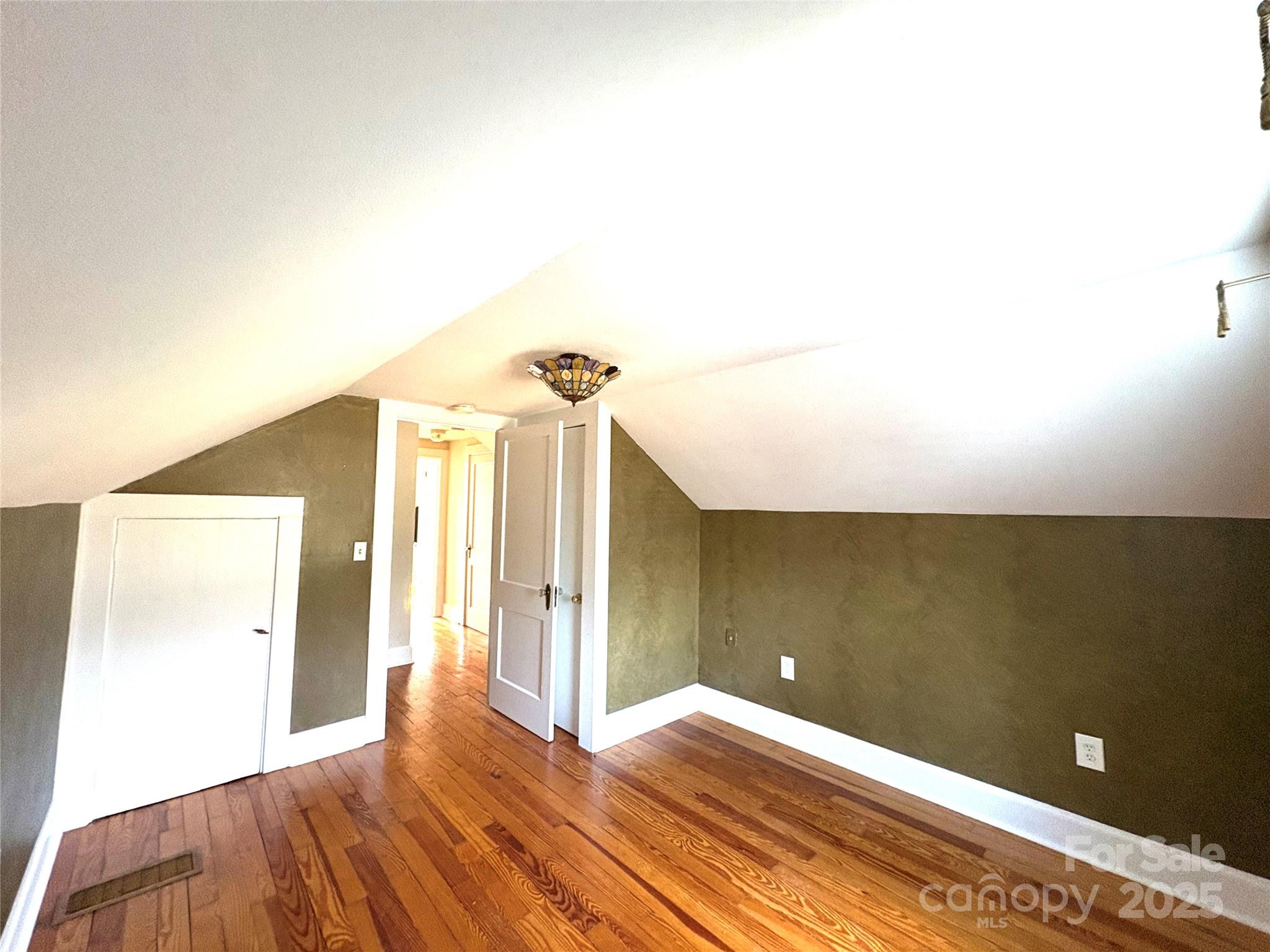 114 Broadway Tryon, NC 28782 - Photo 23 of 41 a view of a hallway with wooden floor