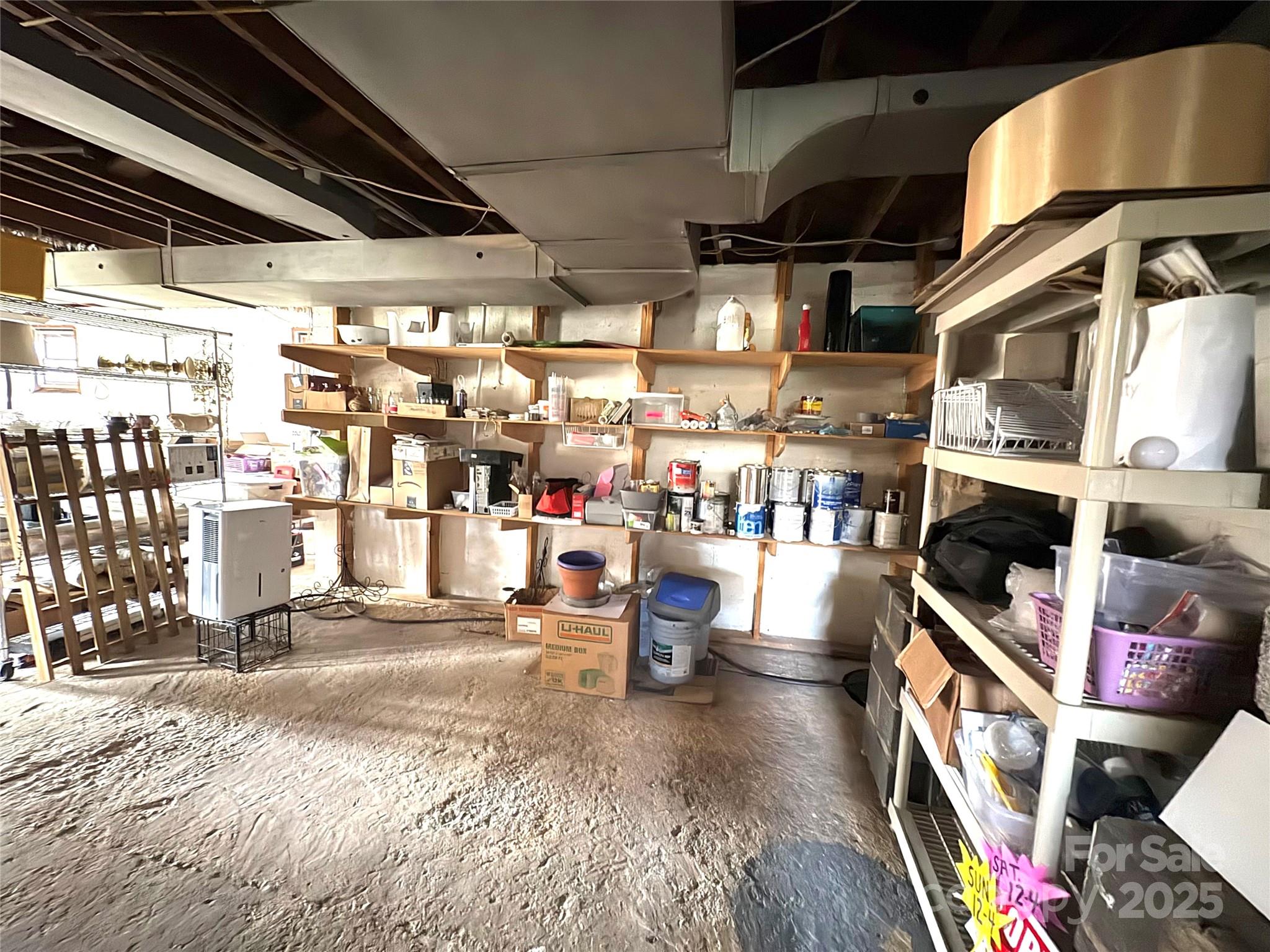 114 Broadway Tryon, NC 28782 - Photo 28 of 41 a view of store room with washer and dryer