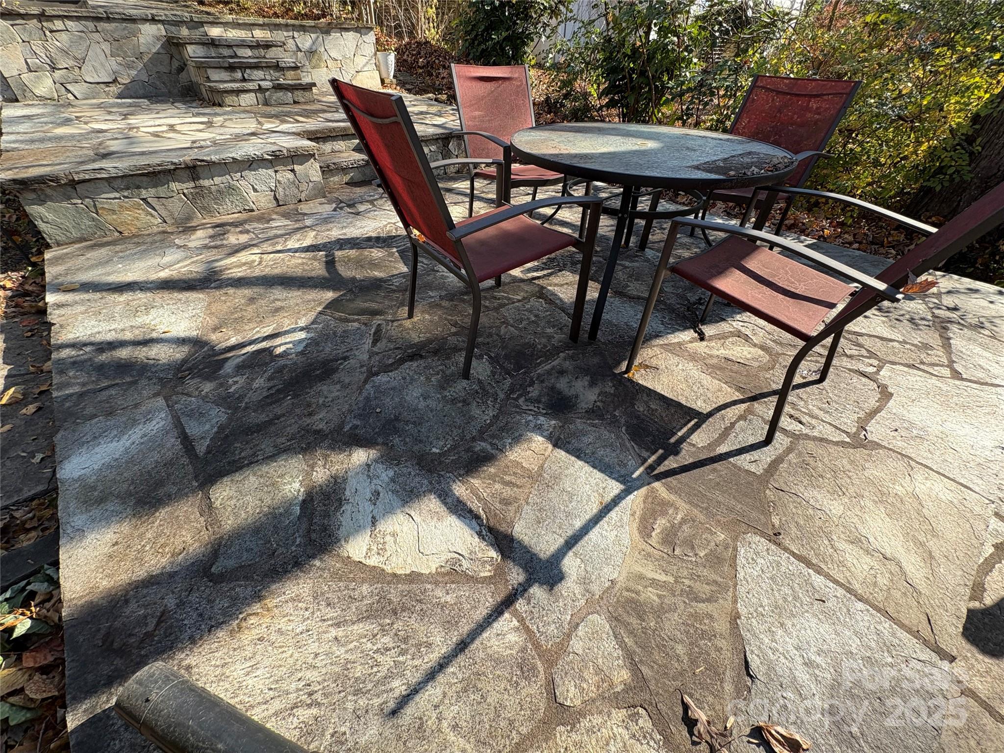 114 Broadway Tryon, NC 28782 - Photo 36 of 41 a view of a chairs and table in the patio