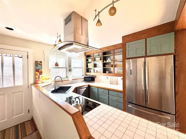 a shelf with books and a shelf with wooden floor