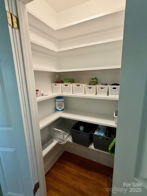 114 Broadway Tryon, NC 28782 - Photo 10 of 41 a shelf with books and a shelf with wooden floor