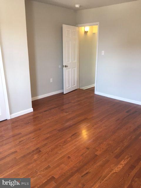 2445 East Huntingdon Street Philadelphia, PA 19125 - Photo 11 of 24 a view of an empty room with wooden floor