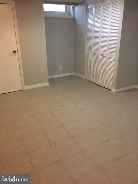 2445 East Huntingdon Street Philadelphia, PA 19125 - Photo 14 of 24 an empty room with windows