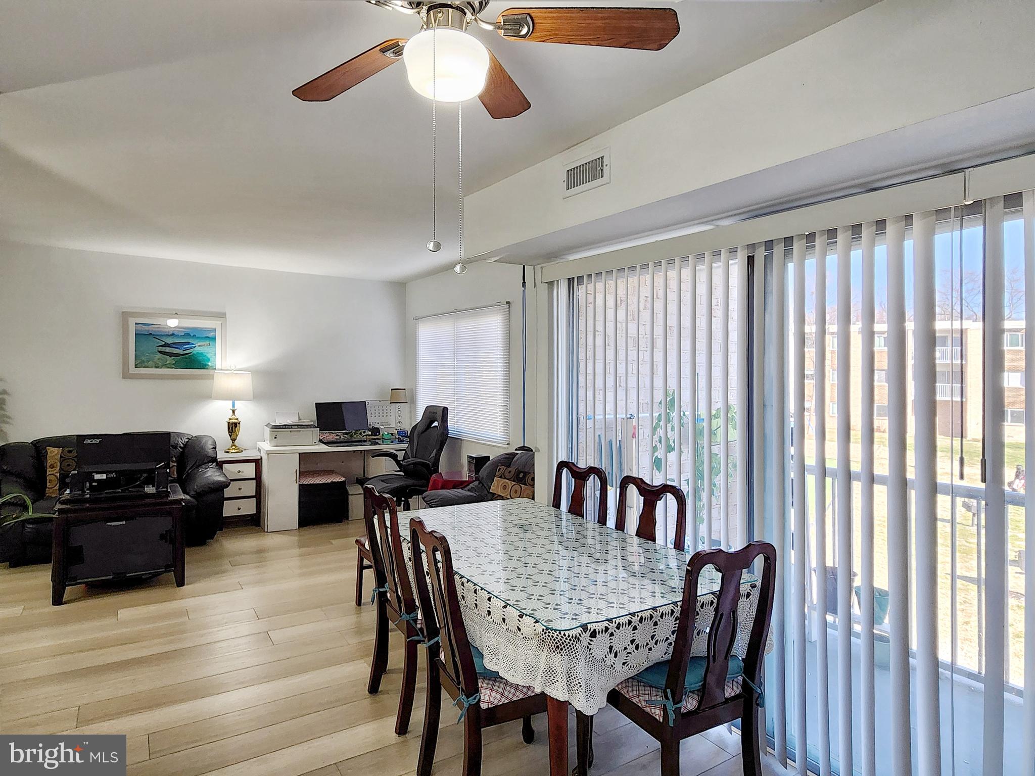 2901 Charing Cross Road, Unit 8 Falls Church, VA 22042 - Photo 11 of 40 a view of a dining room with furniture and window