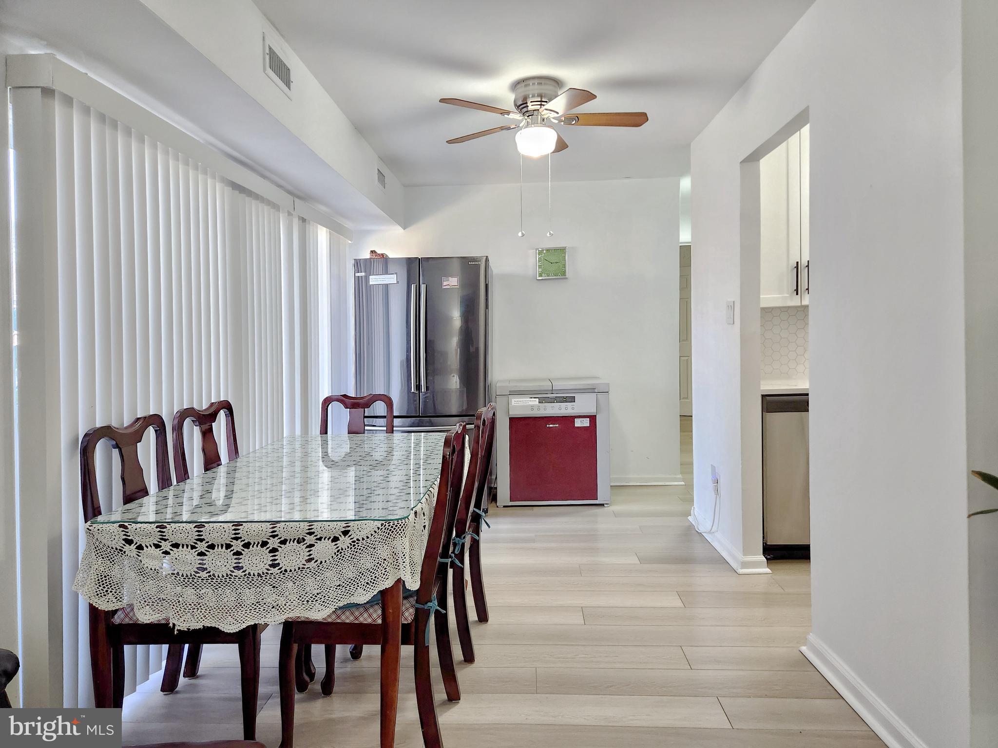 2901 Charing Cross Road, Unit 8 Falls Church, VA 22042 - Photo 12 of 40 a view of a a dining room with furniture window and wooden floor
