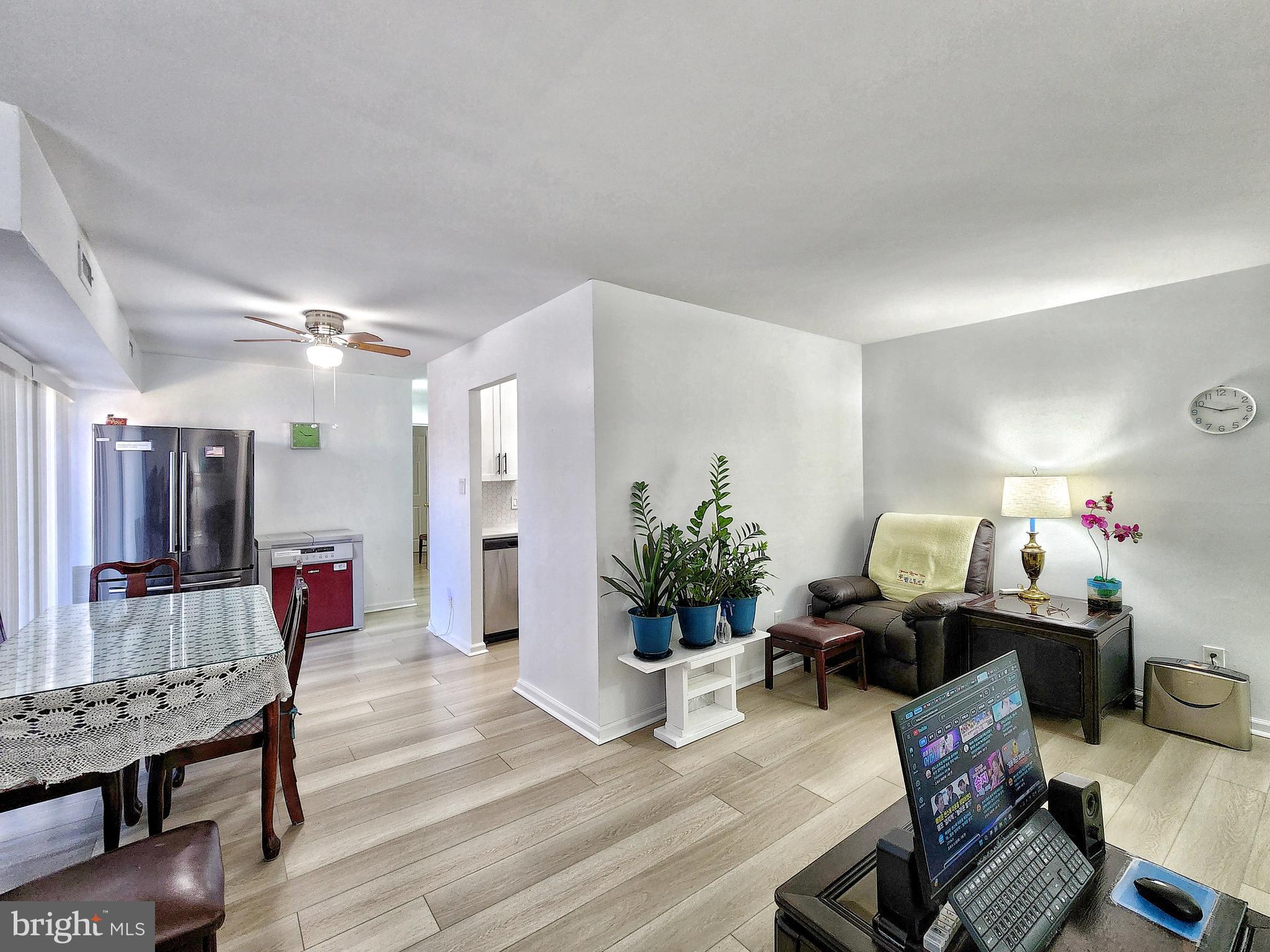 2901 Charing Cross Road, Unit 8 Falls Church, VA 22042 - Photo 20 of 40 a living room with furniture and wooden floor
