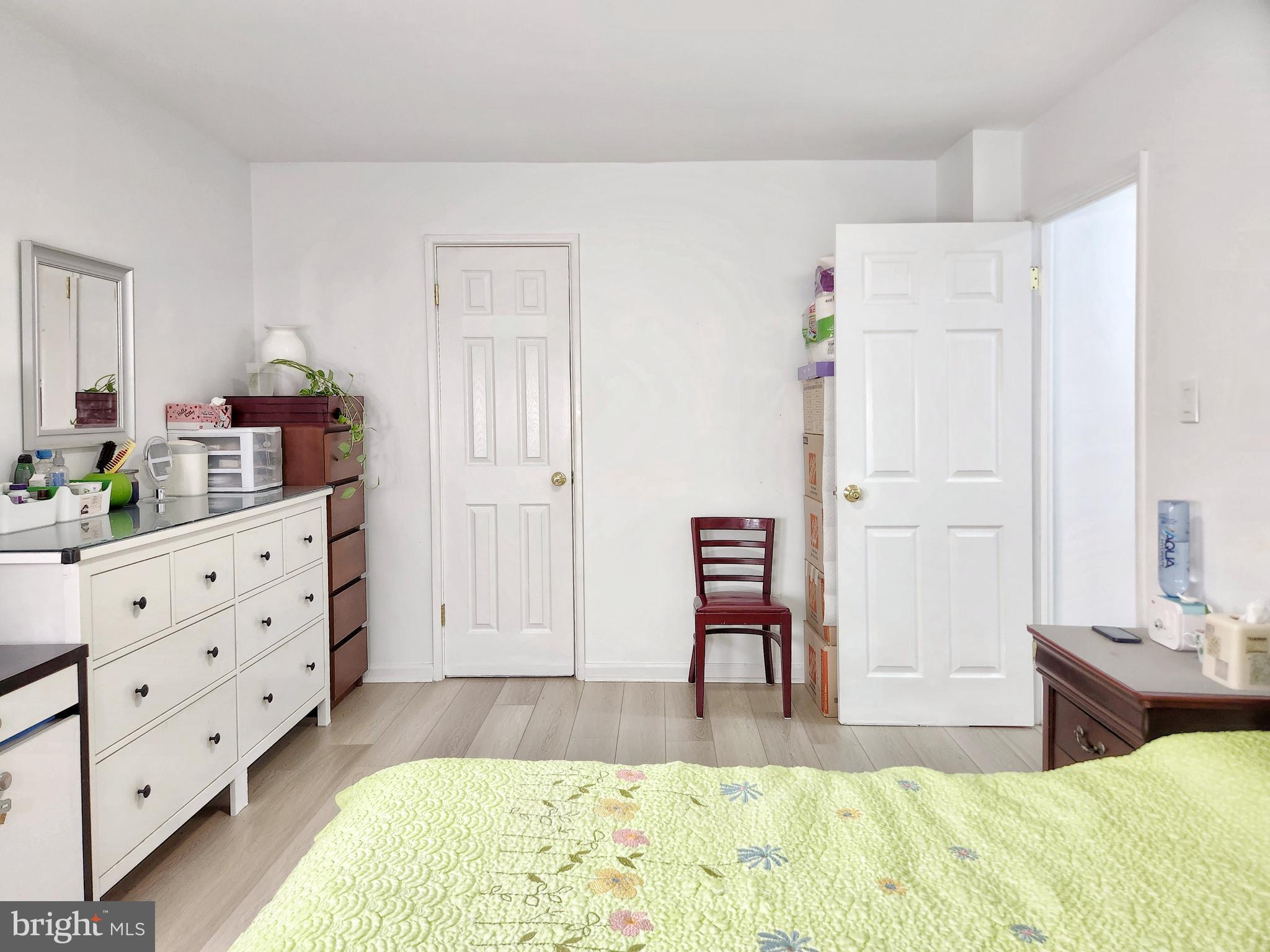 2901 Charing Cross Road, Unit 8 Falls Church, VA 22042 - Photo 24 of 40 a bed room with a bed and a chair