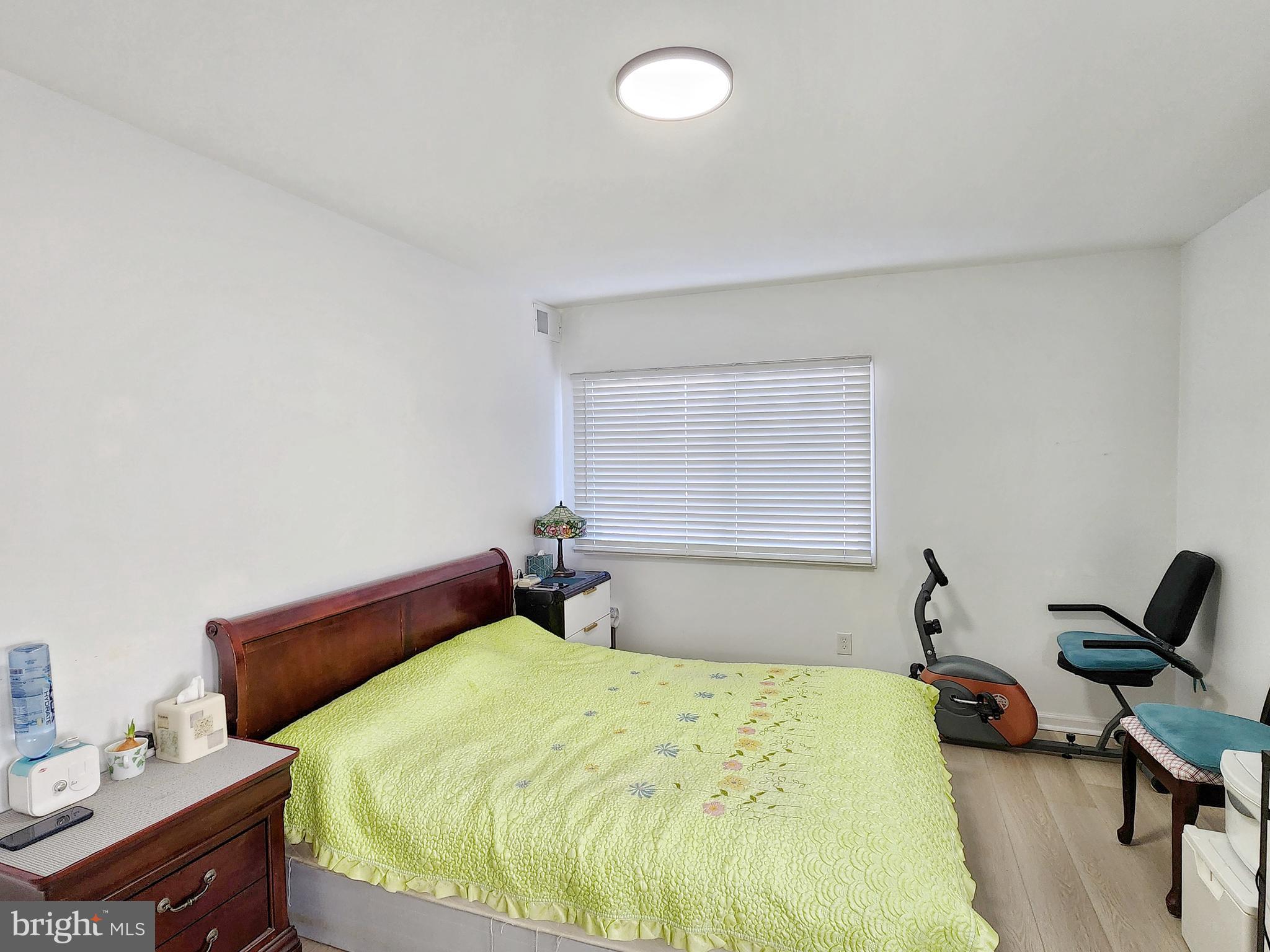 2901 Charing Cross Road, Unit 8 Falls Church, VA 22042 - Photo 25 of 40 a bedroom with a bed and a desk