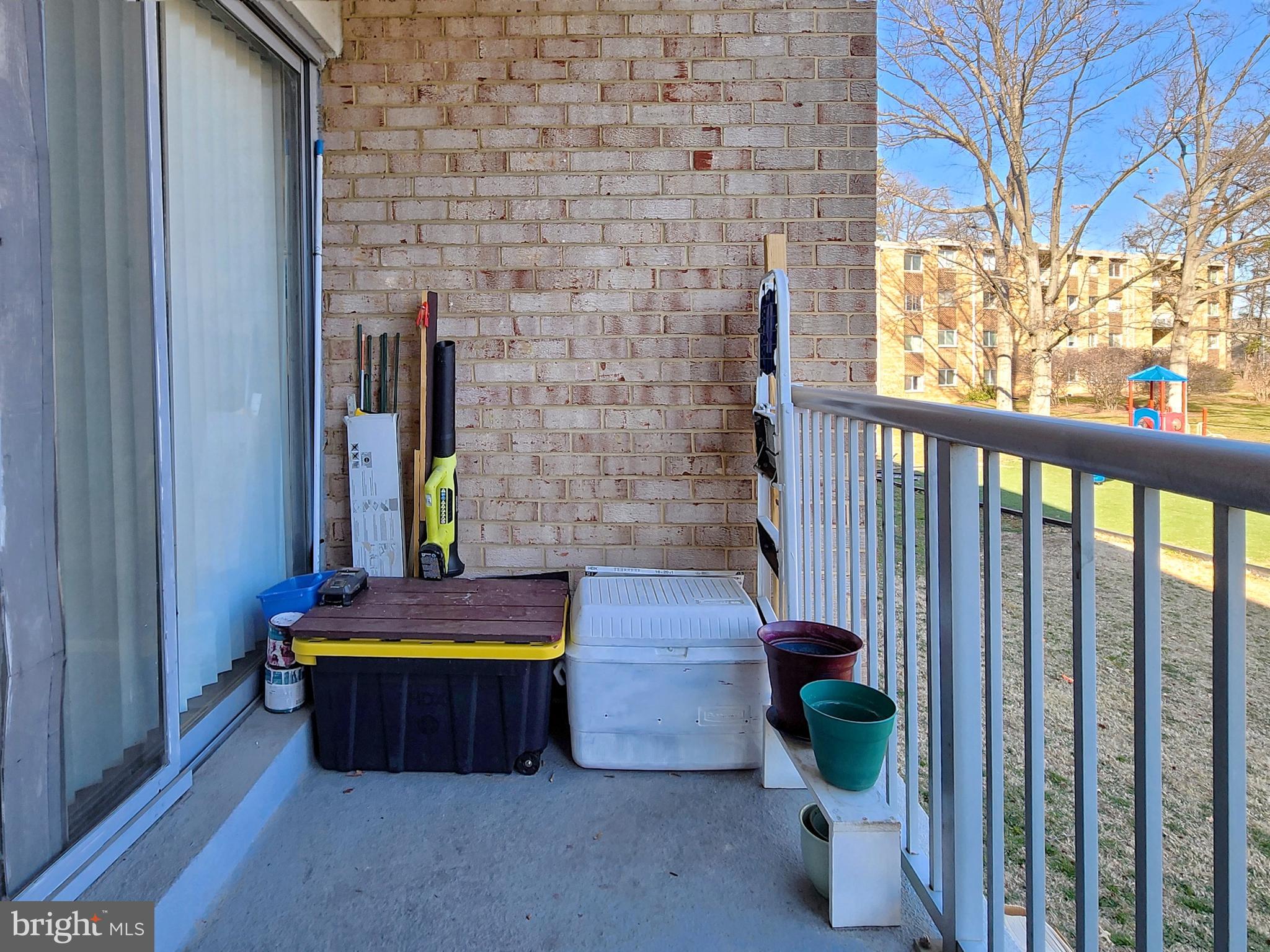 2901 Charing Cross Road, Unit 8 Falls Church, VA 22042 - Photo 30 of 40 a room with a door and wooden floor