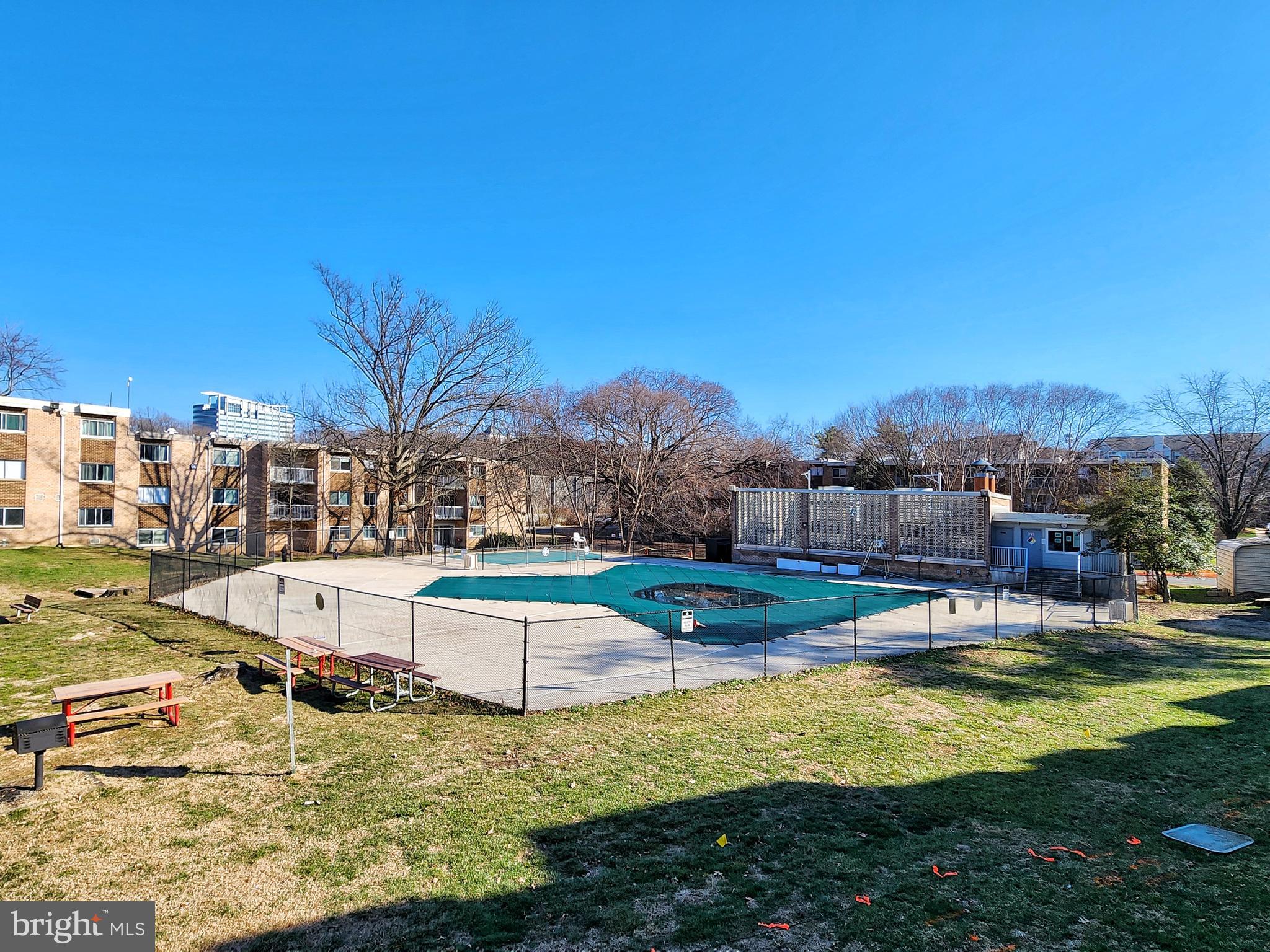 2901 Charing Cross Road, Unit 8 Falls Church, VA 22042 - Photo 34 of 40 a view of a swimming pool with an outdoor space and seating area