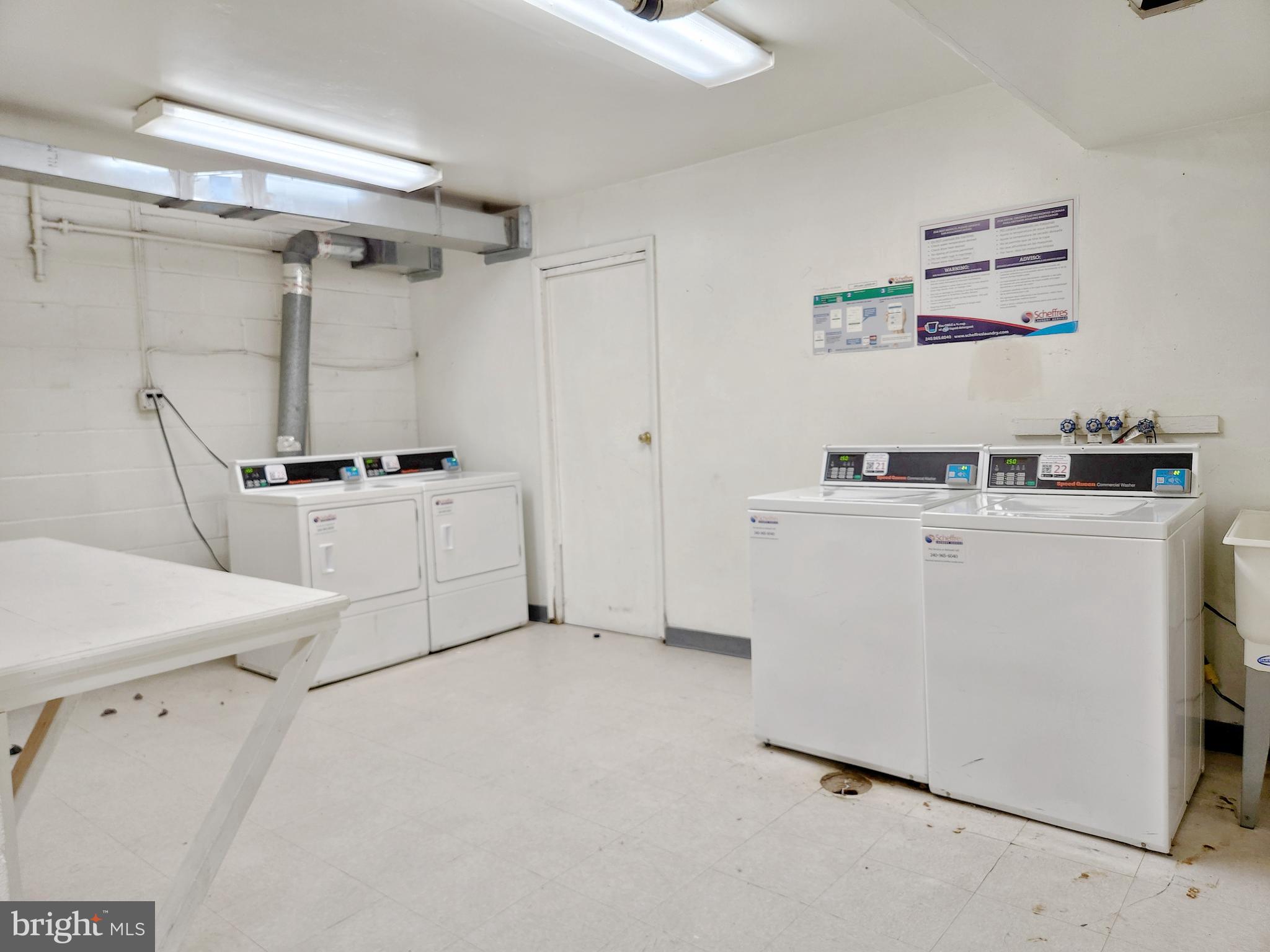 2901 Charing Cross Road, Unit 8 Falls Church, VA 22042 - Photo 36 of 40 a view of kitchen with cabinets and wooden floor