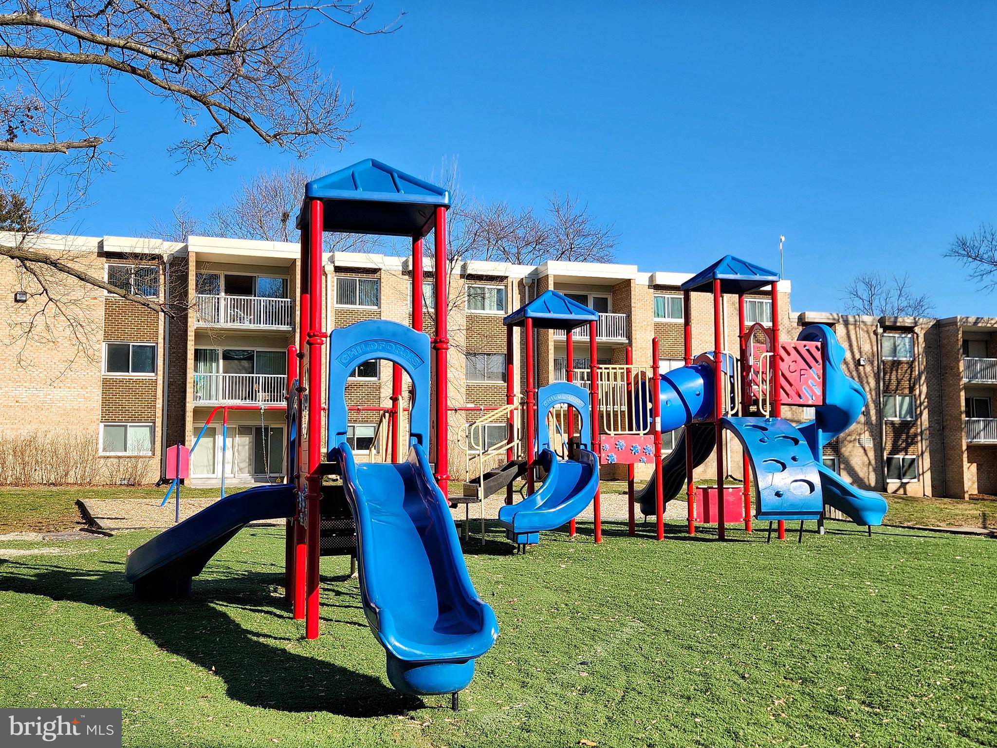 2901 Charing Cross Road, Unit 8 Falls Church, VA 22042 - Photo 39 of 40 a front view of multiple houses with yard and entertaining space