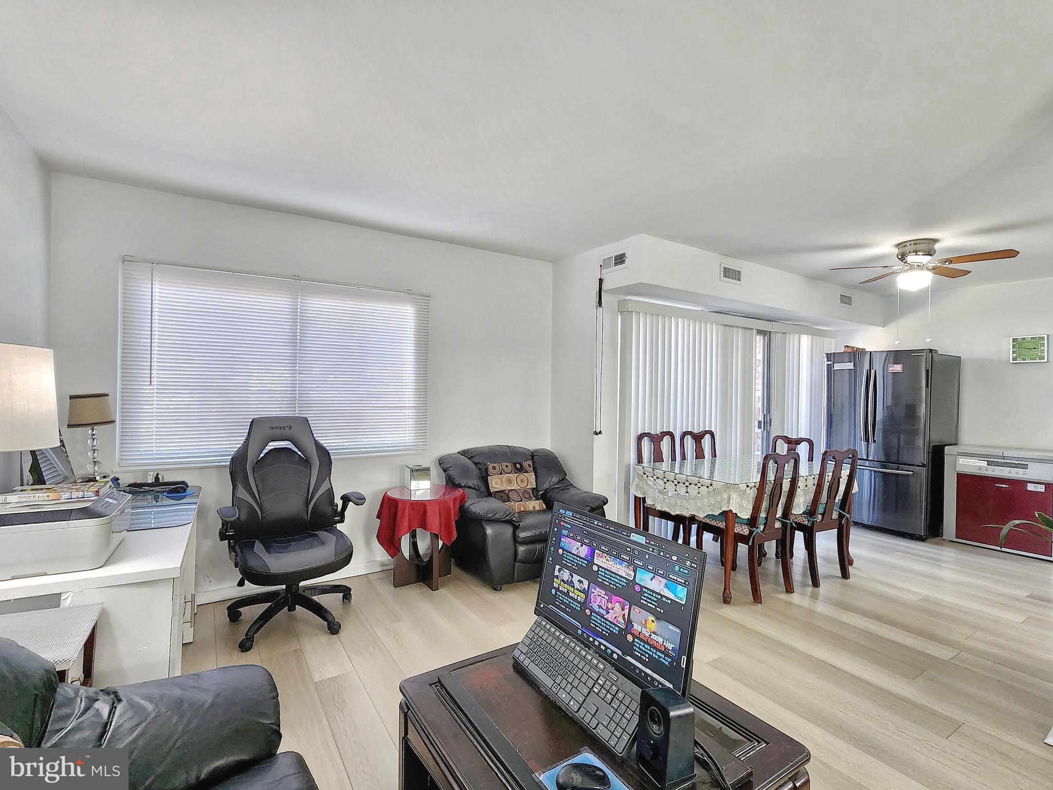 2901 Charing Cross Road, Unit 8 Falls Church, VA 22042 - Photo 10 of 40 a view of a workspace with furniture and a window