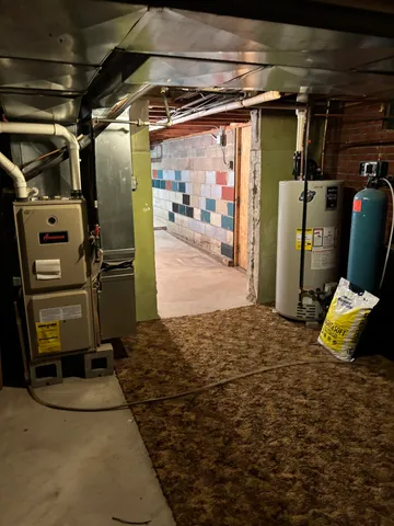 a front view of house with yard and trees