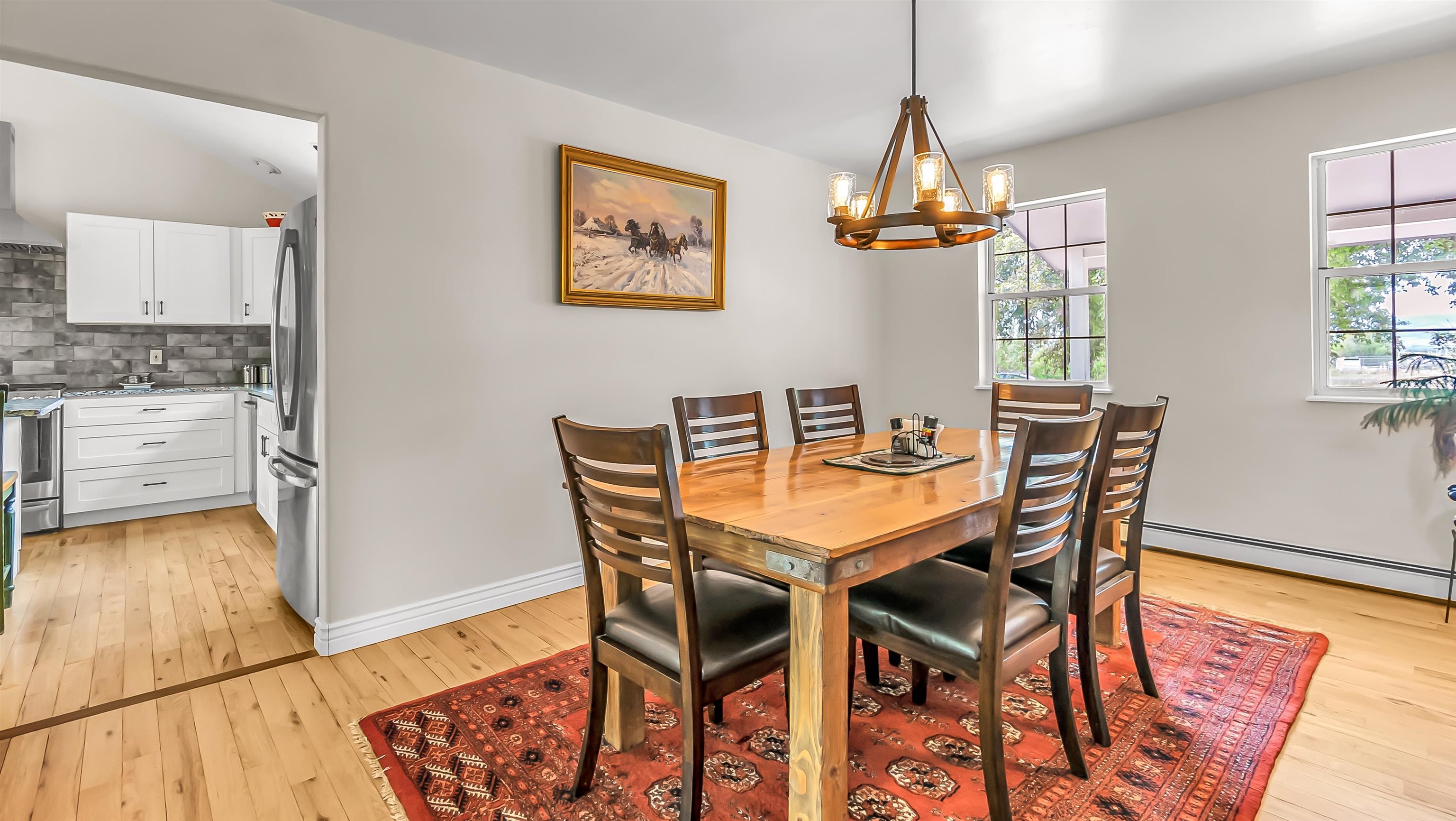 2346 Sundial Road Grand Junction, CO 81505 - Photo 17 of 41 a view of a dining room with furniture window and wooden floor