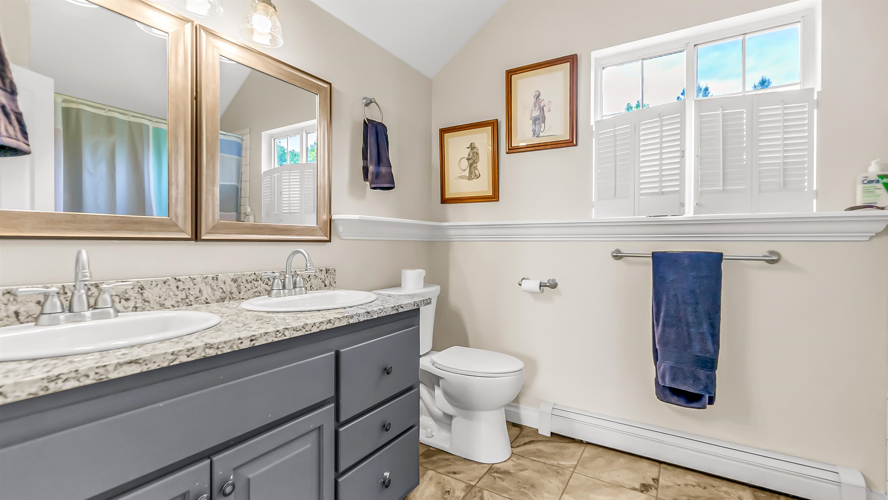 2346 Sundial Road Grand Junction, CO 81505 - Photo 24 of 41 a bathroom with a granite countertop sink mirror vanity and toilet