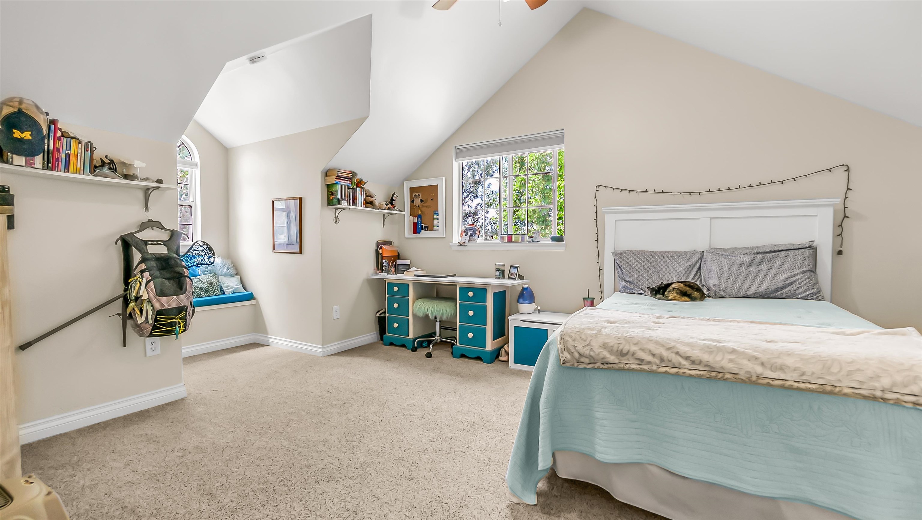 2346 Sundial Road Grand Junction, CO 81505 - Photo 25 of 41 a bedroom with a bed and a window