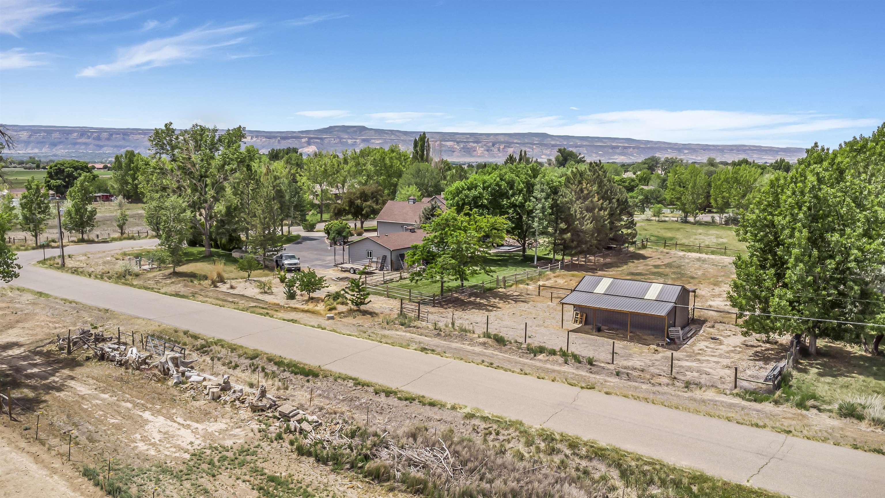 2346 Sundial Road Grand Junction, CO 81505 - Photo 38 of 41 a backyard of a house with table and chairs