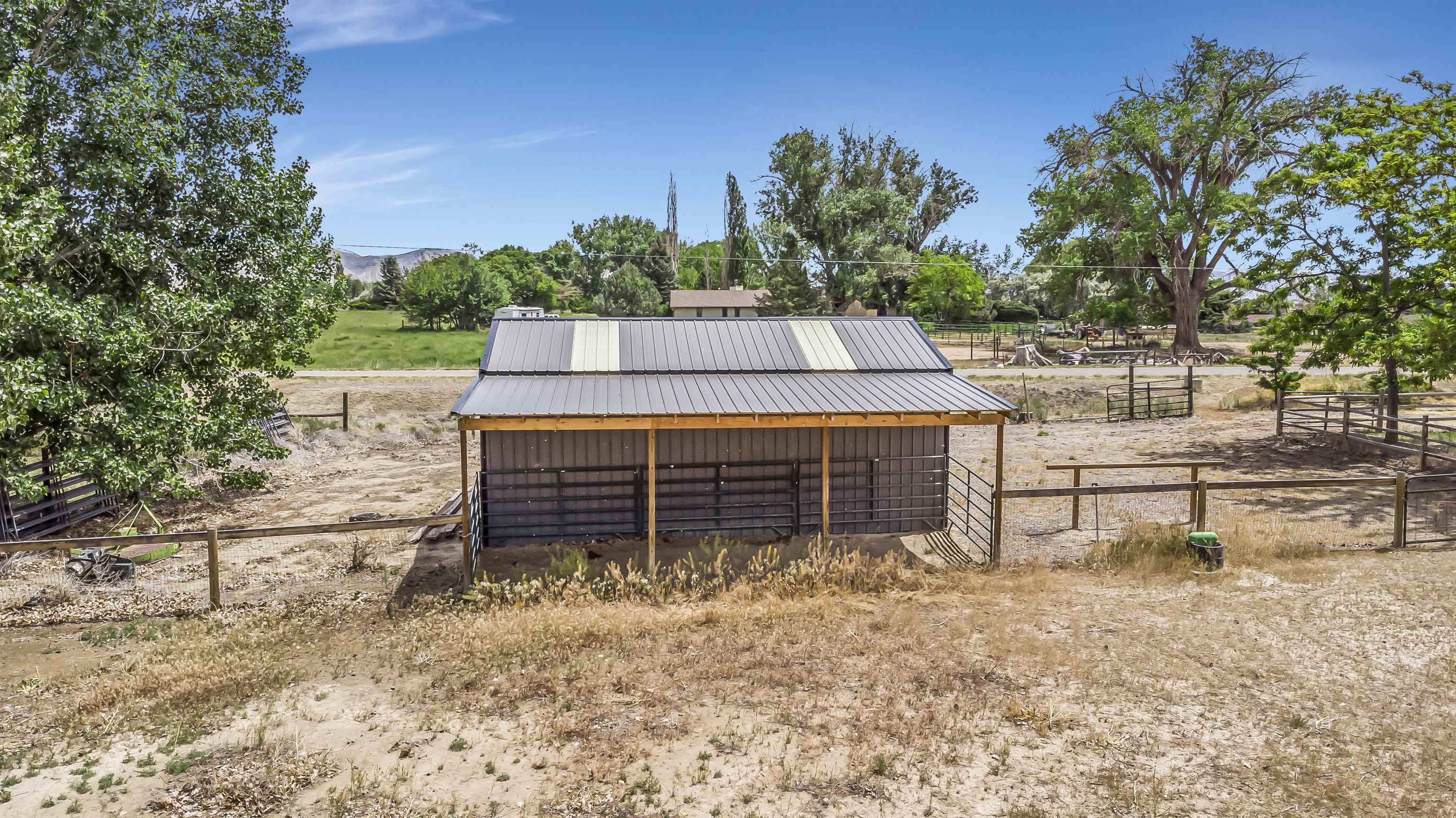 2346 Sundial Road Grand Junction, CO 81505 - Photo 40 of 41 a view of a wooden deck and a yard