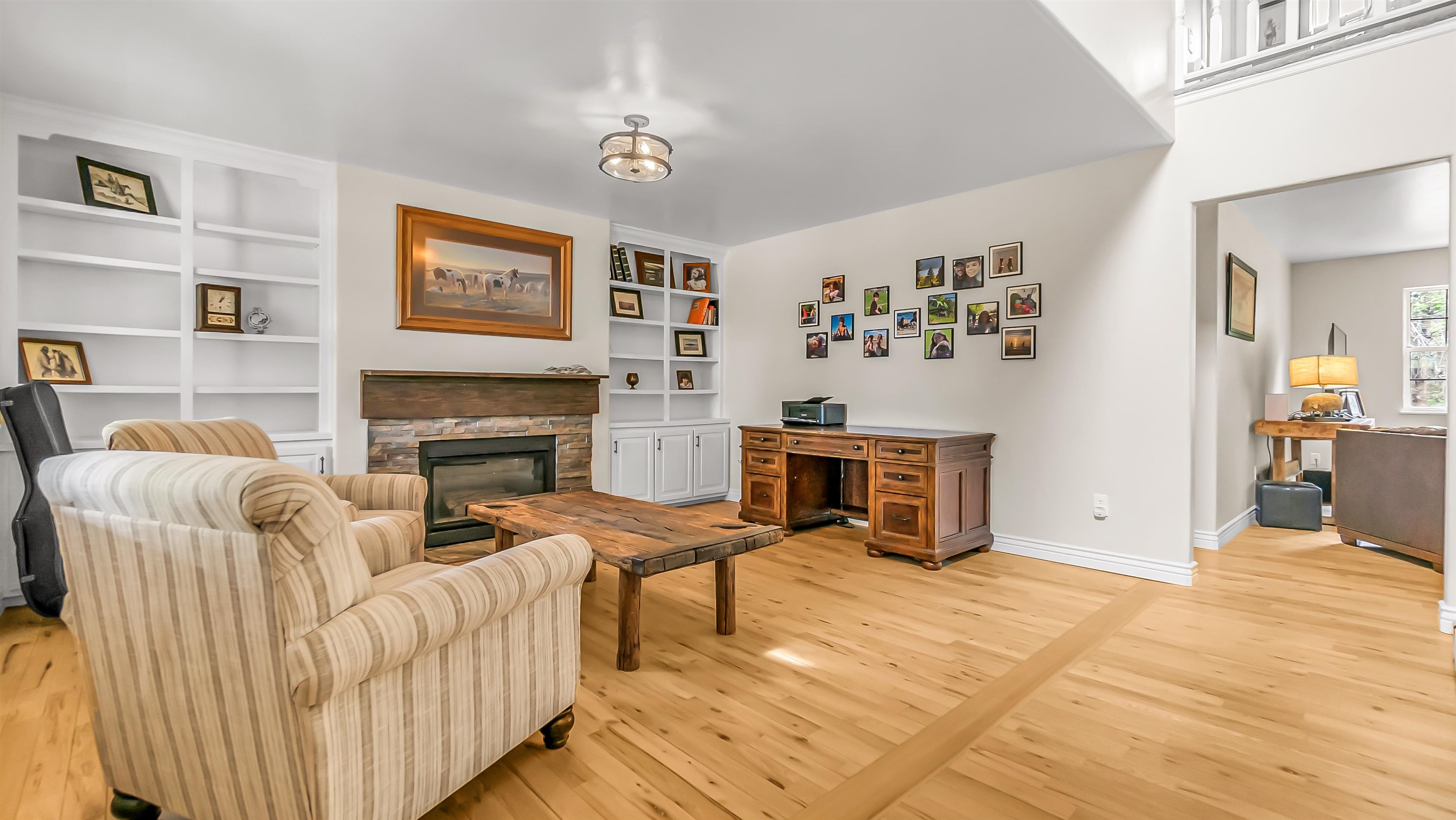 2346 Sundial Road Grand Junction, CO 81505 - Photo 5 of 41 a living room with furniture and a fireplace