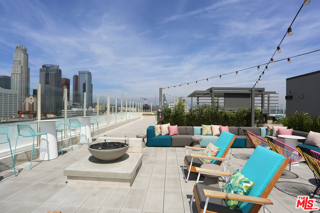 732 South Spring Street, Unit 918 Los Angeles, CA 90014 - Photo 27 of 31 a view of a patio with couches chairs and a potted plant