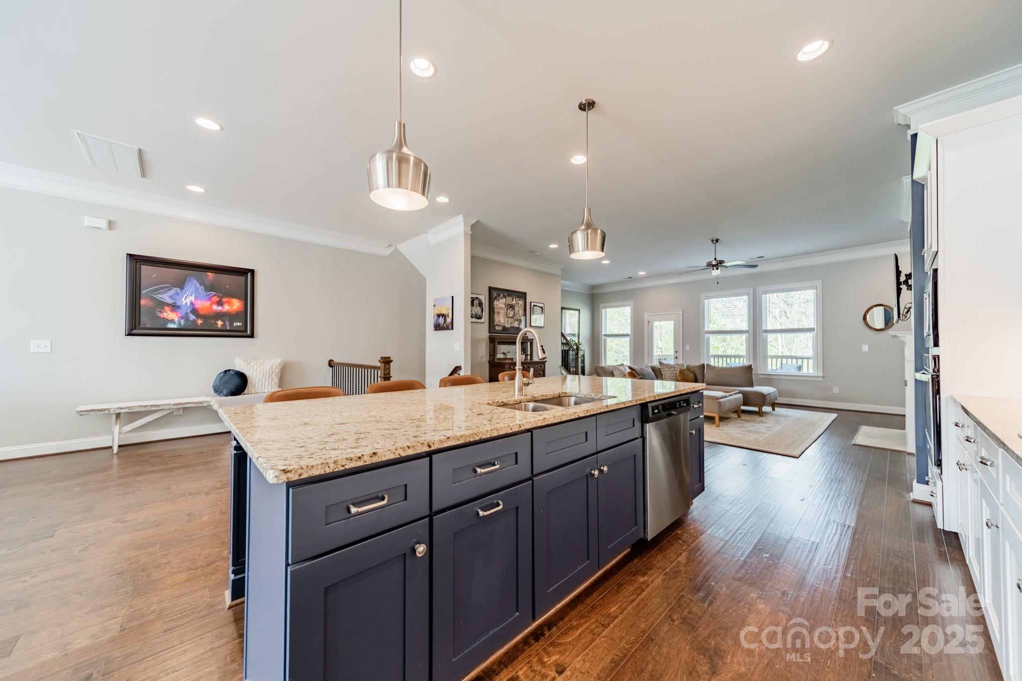 15133 Rocky Bluff Loop Davidson, NC 28036 - Photo 11 of 47 a room with lots of counter space and painting on the wall