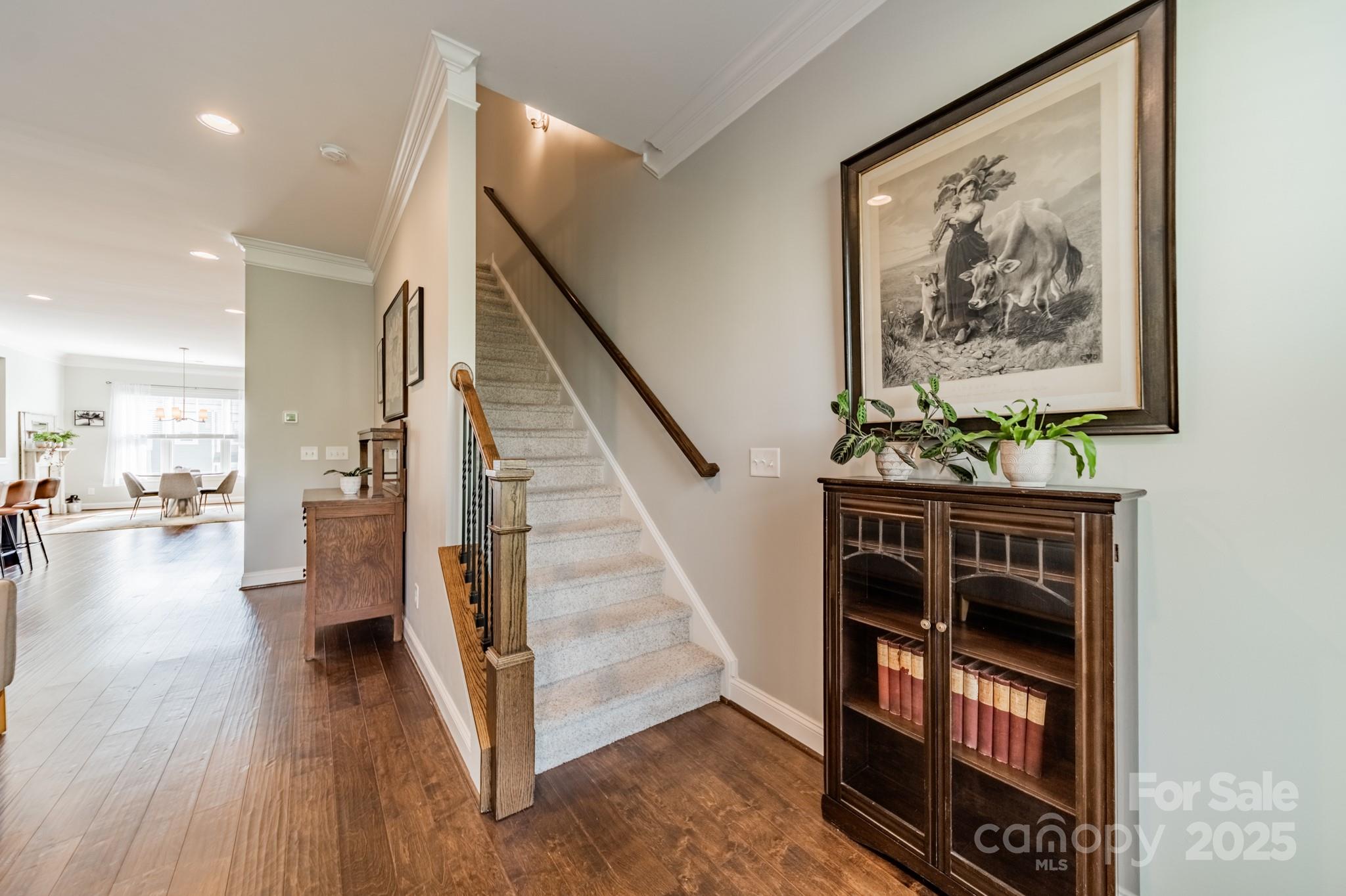15133 Rocky Bluff Loop Davidson, NC 28036 - Photo 16 of 47 a view of entryway and hall with wooden floor