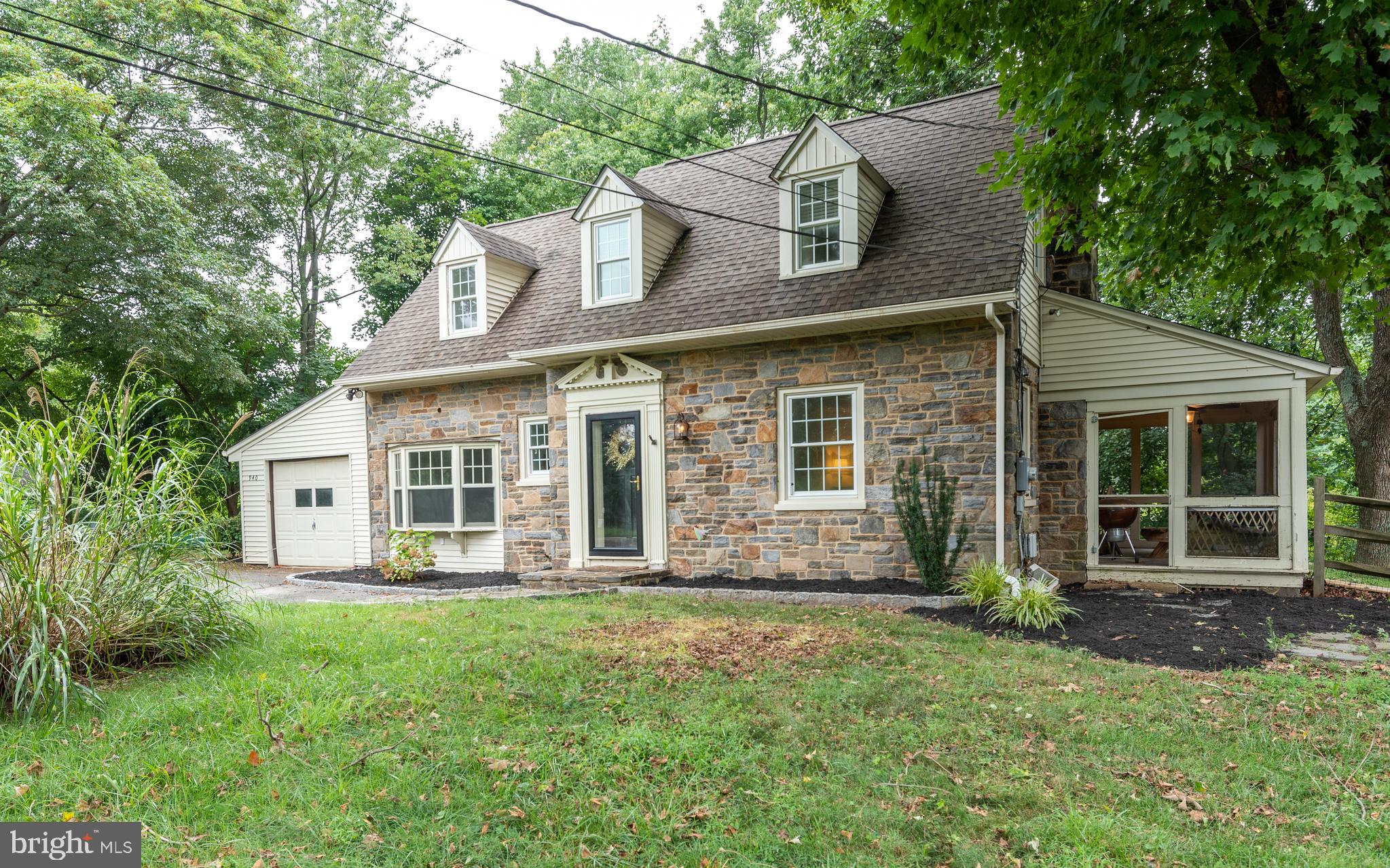 940 Sharpless Road Hockessin, DE 19707 - Photo 2 of 21 Front of Home with Screened Porch Views