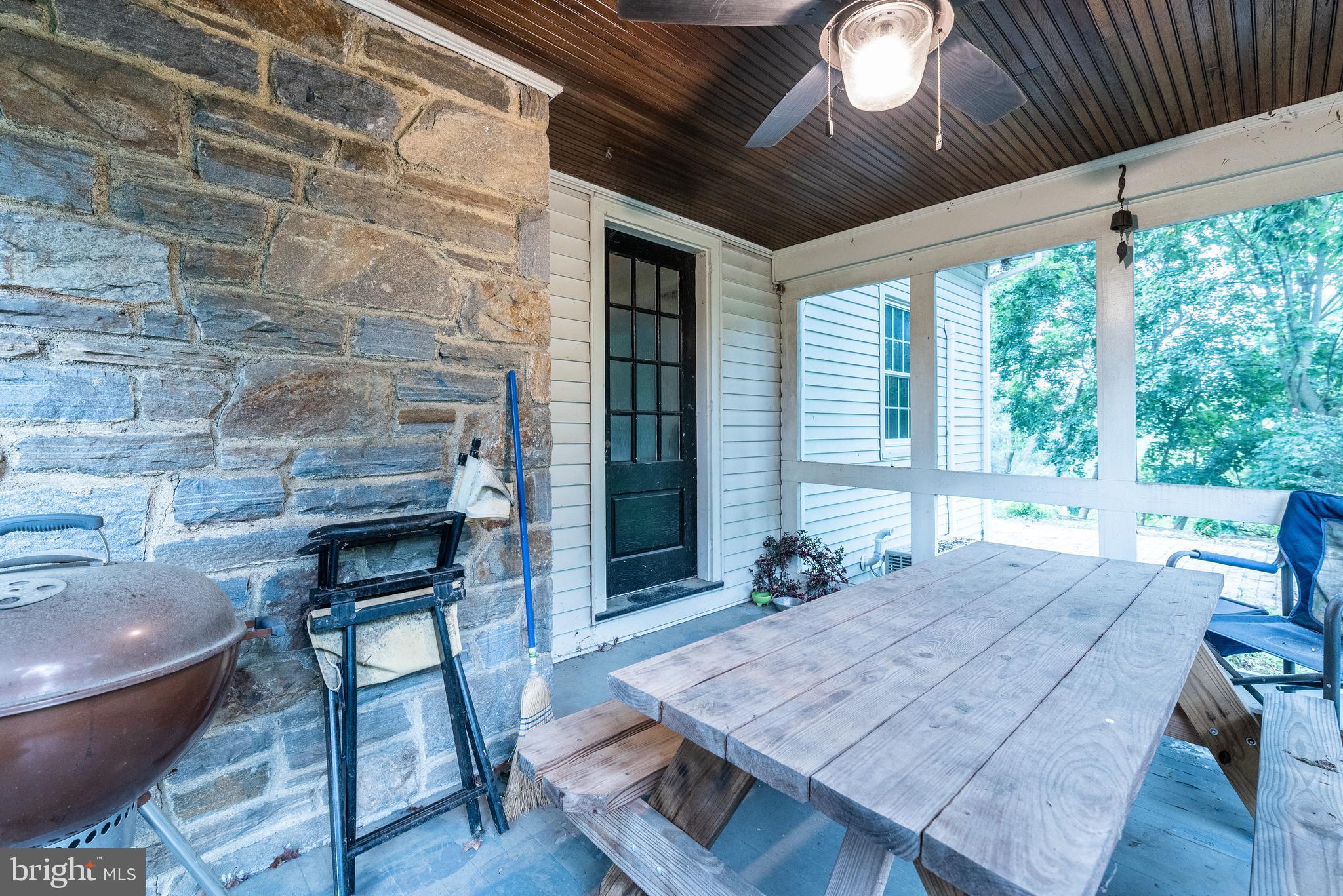 940 Sharpless Road Hockessin, DE 19707 - Photo 16 of 21 Screened Porch Area off Living Room