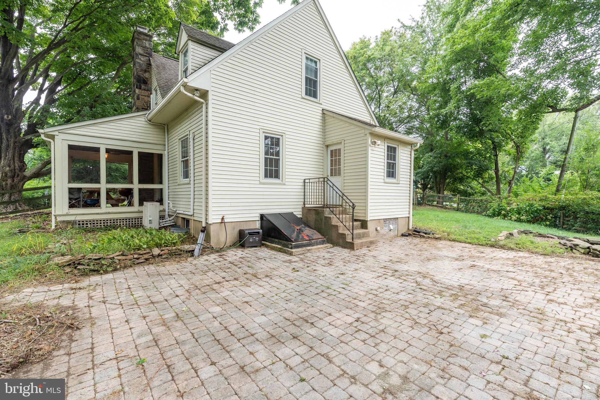 940 Sharpless Road Hockessin, DE 19707 - Photo 17 of 21 Paver Patio with Plenty of Entertaining Room