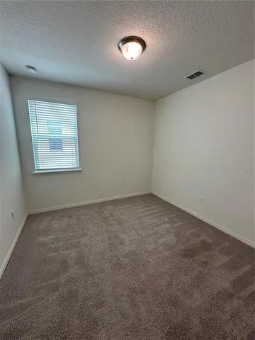 an empty room with a workbench