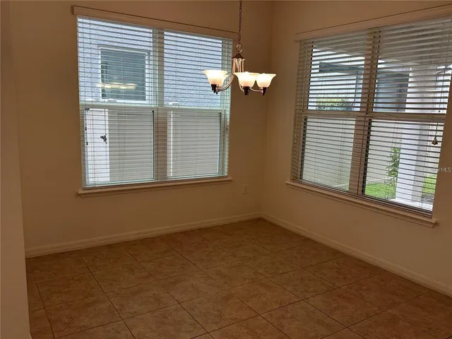 a view of a room that has a window in it